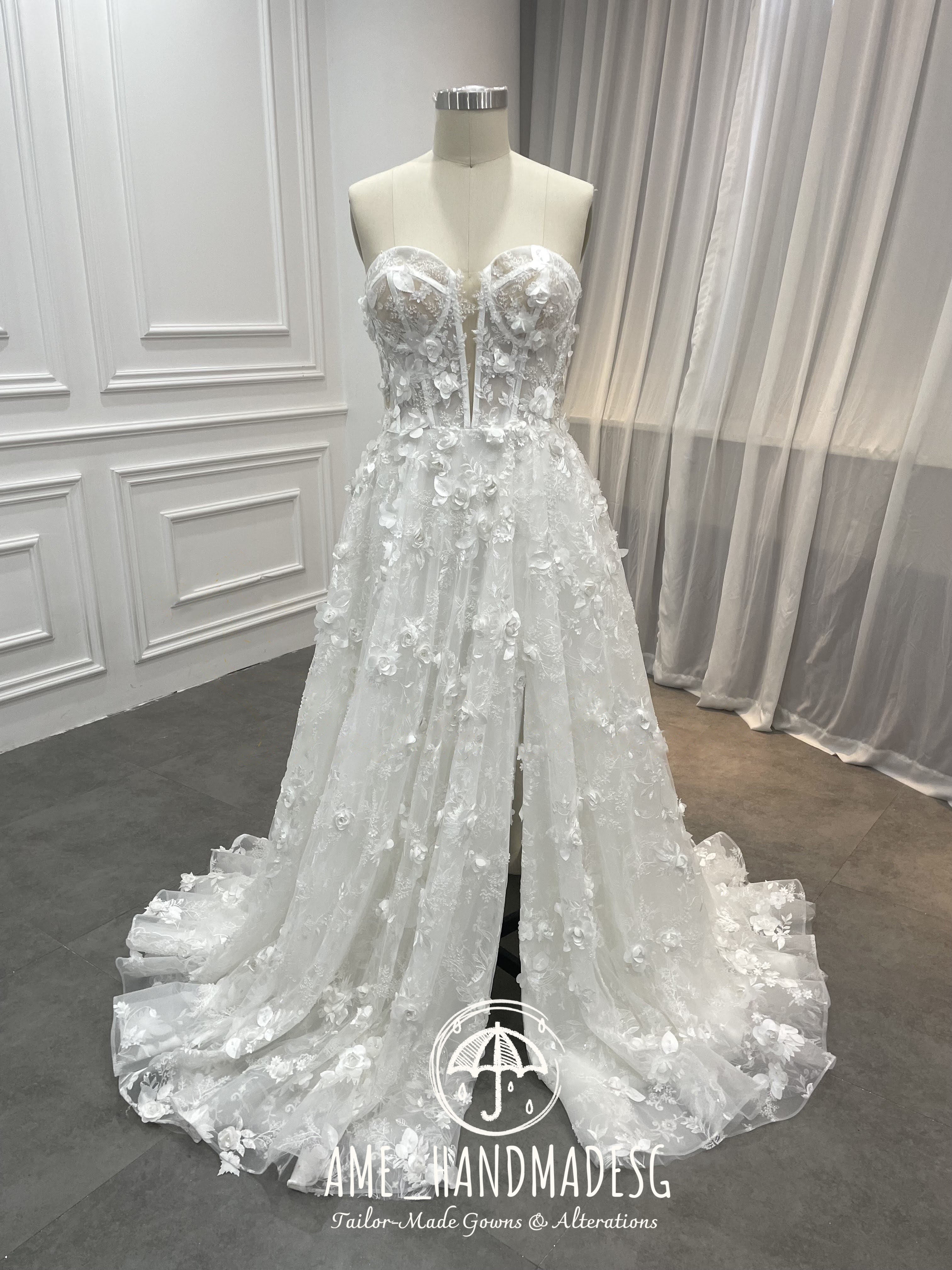 Romantic Off-Shoulder Floral Lace Wedding Gown with Corset Bodice & Flowing Train - Image 3
