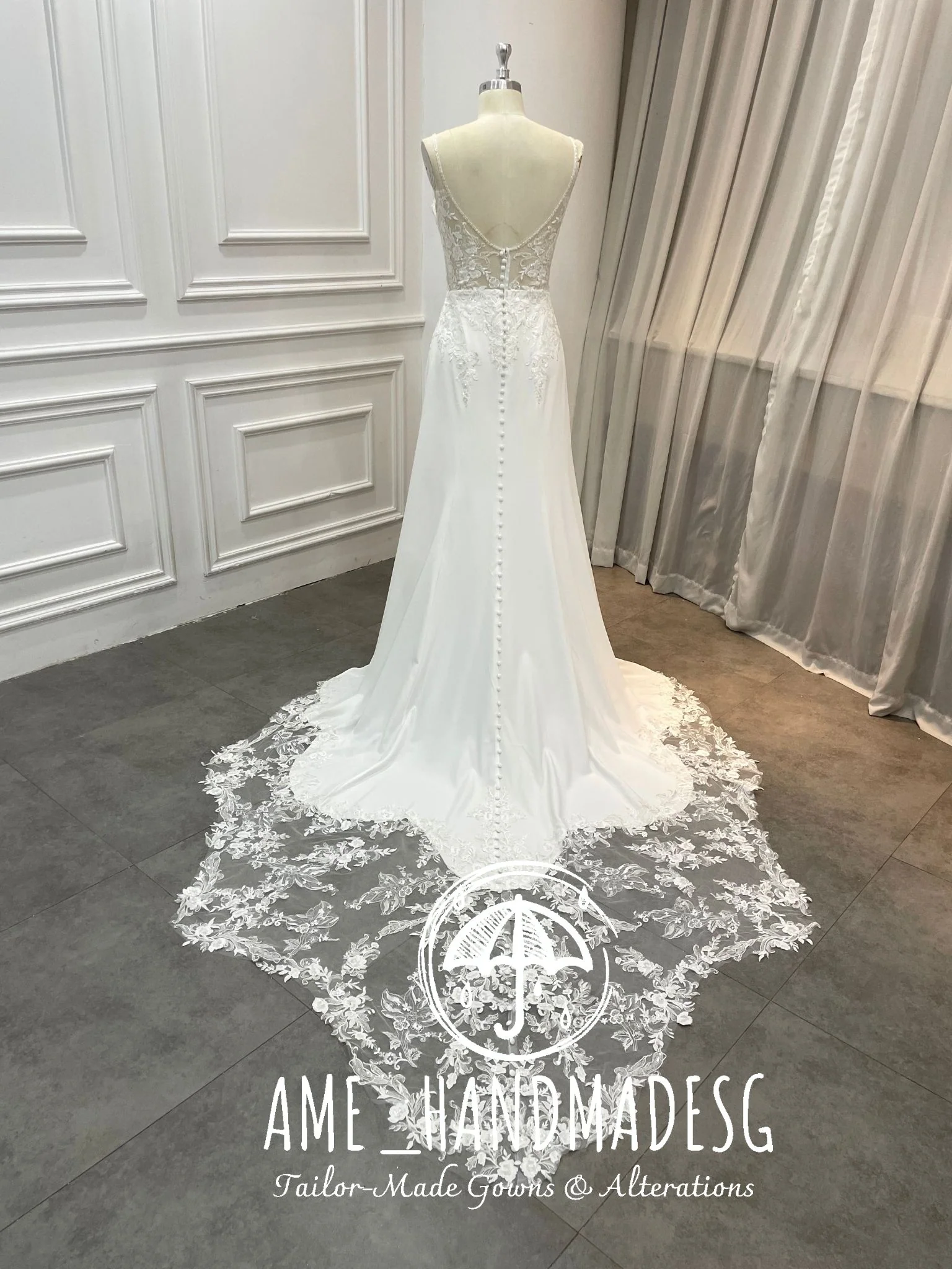Whispered Elegance — Illusion Back Lace Wedding Gown with Buttoned Train - Image 2
